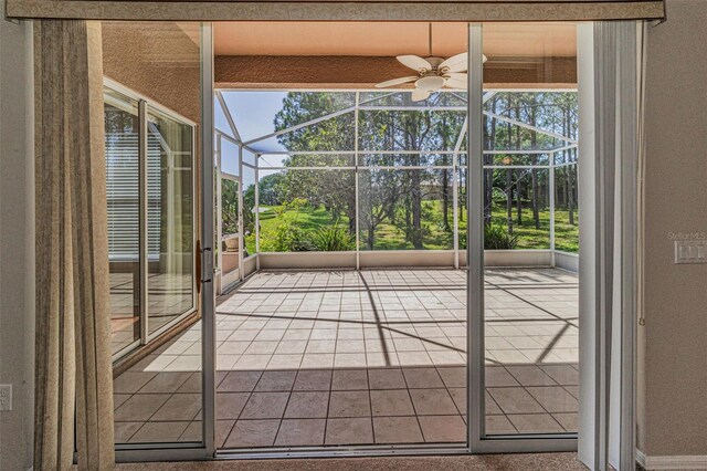 617 Glastonbury Ct, Spring Hill, FL 34609 - unfurnished sunroom with a ceiling fan