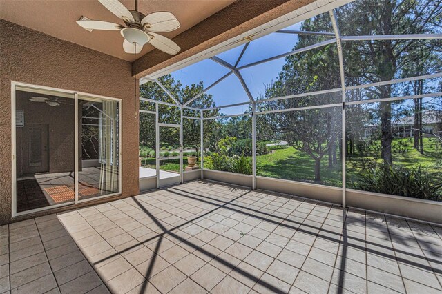 617 Glastonbury Ct, Spring Hill, FL 34609 - unfurnished sunroom featuring ceiling fan