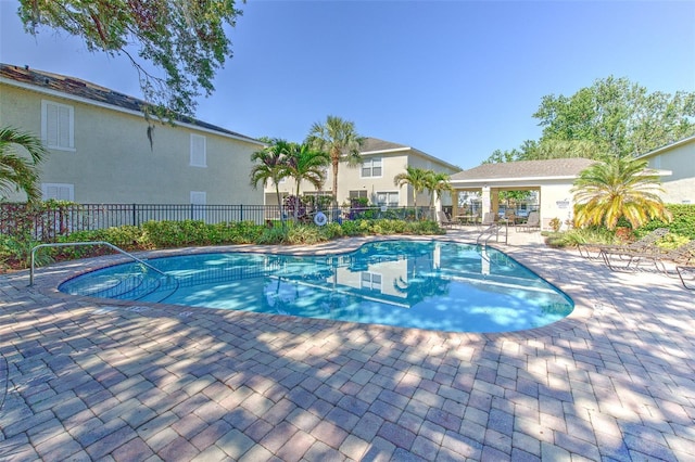 3456 High Hampton Cir, Tampa, FL 33610 - pool with a patio and fence