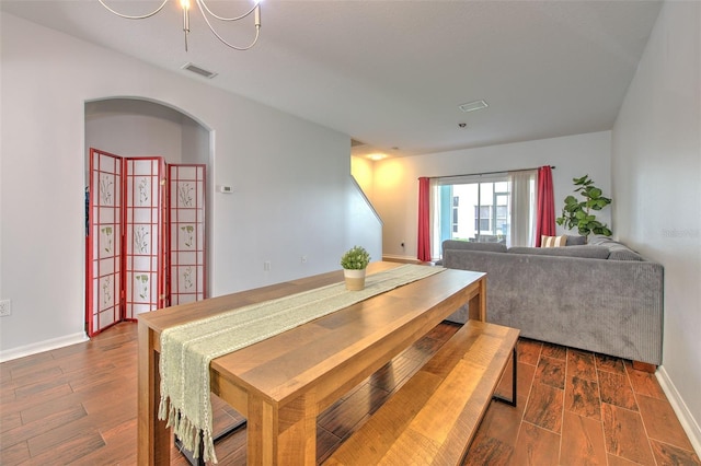 3456 High Hampton Cir, Tampa, FL 33610 - dining area featuring dark wood-style flooring, baseboards, and visible vents