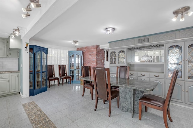 2014 E Broad St, Tampa, FL 33610 - dining area featuring light tile patterned floors, visible vents, and french doors