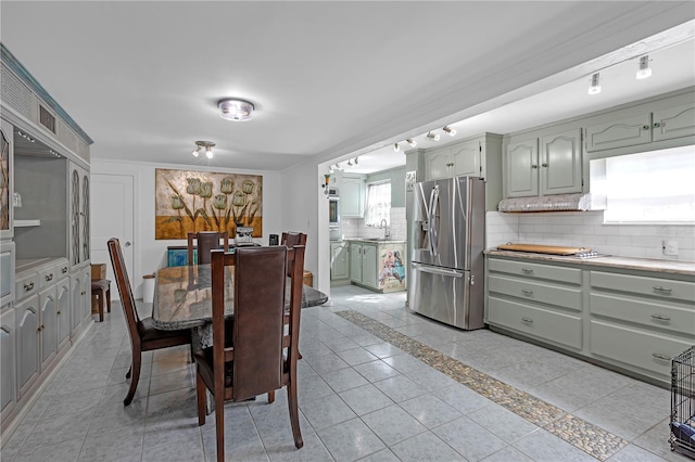 2014 E Broad St, Tampa, FL 33610 - dining room with light tile patterned floors