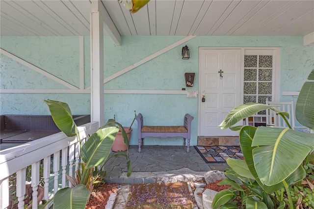 2014 E Broad St, Tampa, FL 33610 - property entrance featuring stucco siding