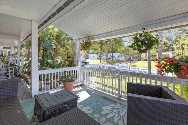 2014 E Broad St, Tampa, FL 33610 - wooden terrace with covered porch