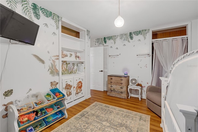 2014 E Broad St, Tampa, FL 33610 - recreation room with wood finished floors