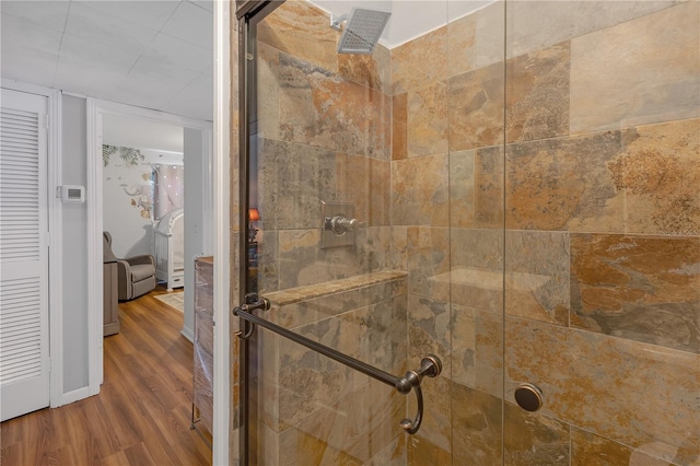 2014 E Broad St, Tampa, FL 33610 - room details with a stall shower and wood finished floors