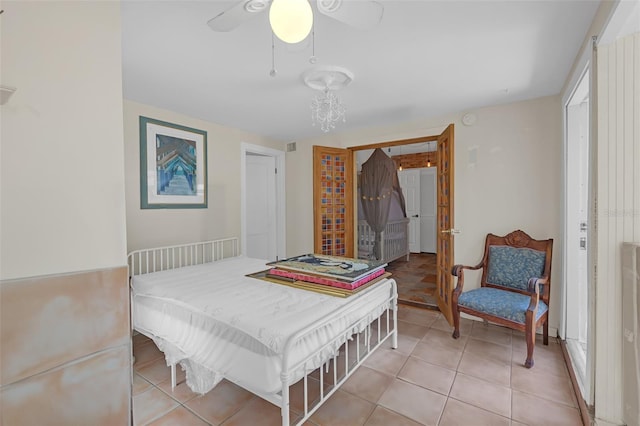 2014 E Broad St, Tampa, FL 33610 - bedroom with light tile patterned flooring