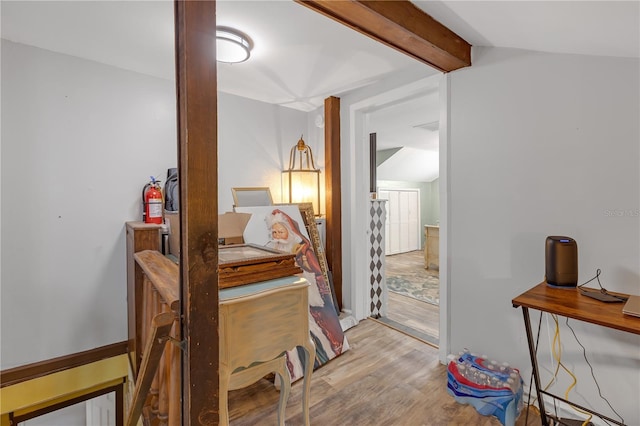 2014 E Broad St, Tampa, FL 33610 - hall featuring vaulted ceiling with beams and wood finished floors