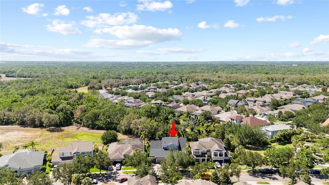bird's eye view with a residential view and a view of trees