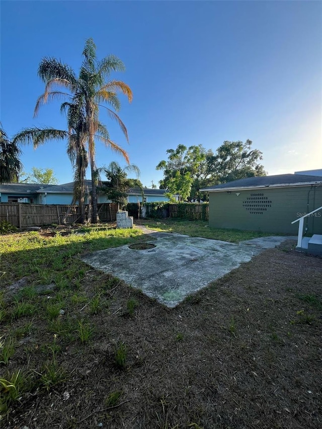 view of yard with a fenced backyard