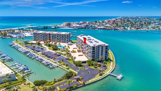 1 Key Capri Unit 608E, Treasure Island, FL 33706 - bird's eye view of a large body of water and apartment complex / building