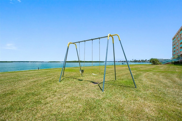 1 Key Capri Unit 608E, Treasure Island, FL 33706 - view of community with a water view and a yard