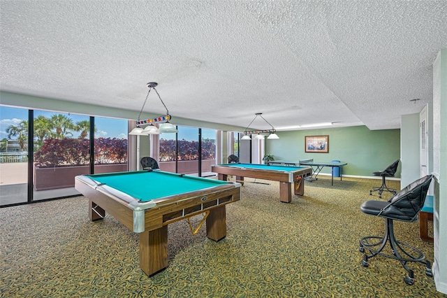 1 Key Capri Unit 608E, Treasure Island, FL 33706 - rec room with billiards table, carpet flooring, baseboards, and a textured ceiling