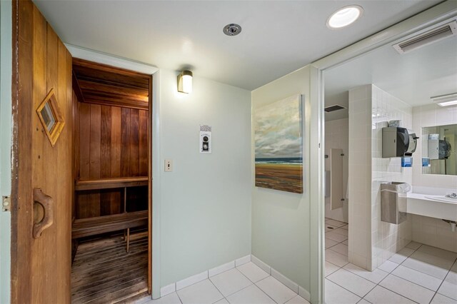 1 Key Capri Unit 608E, Treasure Island, FL 33706 - sauna / steam room with tile patterned flooring and baseboards