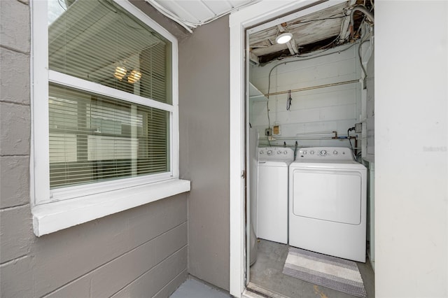 laundry area with laundry area and independent washer and dryer