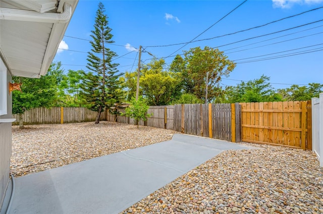 exterior space with a fenced backyard