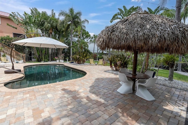 outdoor pool featuring a patio