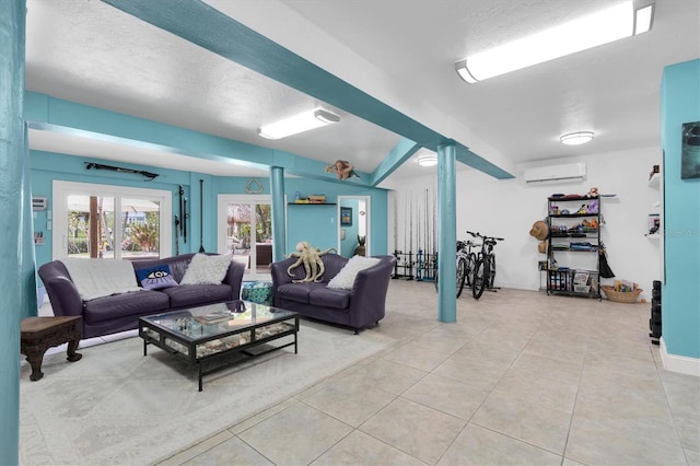 living area featuring a wall unit AC and light tile patterned floors
