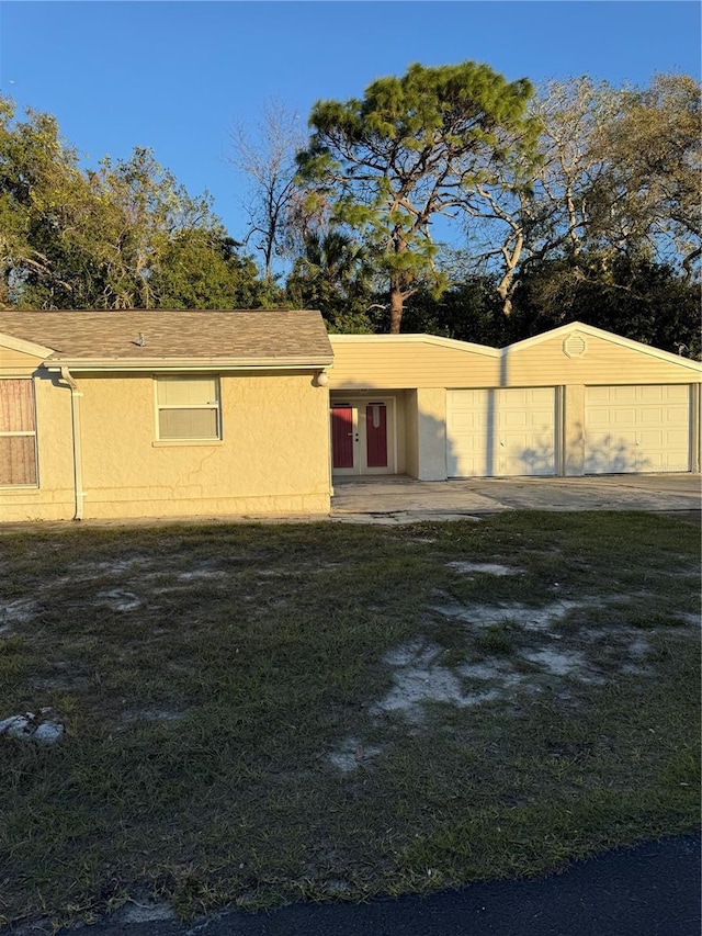 9900 Ideal Ln, Hudson, FL 34667 - view of front of home with stucco siding