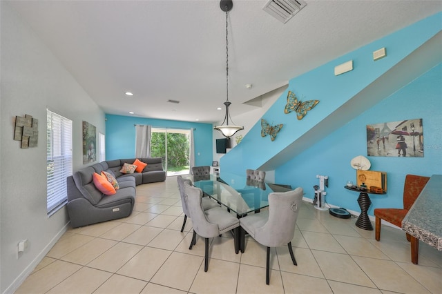 dining space featuring baseboards, tile patterned flooring, visible vents, and recessed lighting