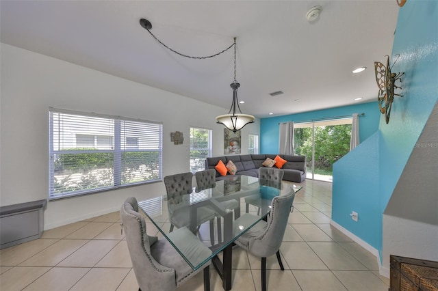 dining area featuring recessed lighting, baseboards, and light tile patterned floors