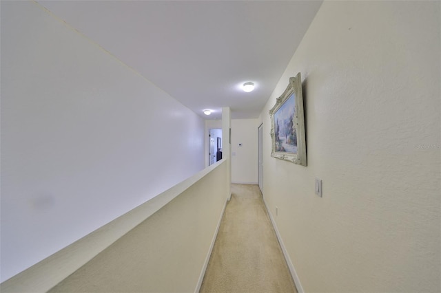 corridor featuring baseboards