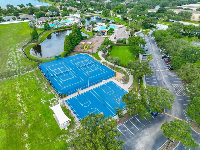birds eye view of property featuring a water view