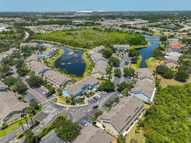 aerial view featuring a water view and a residential view