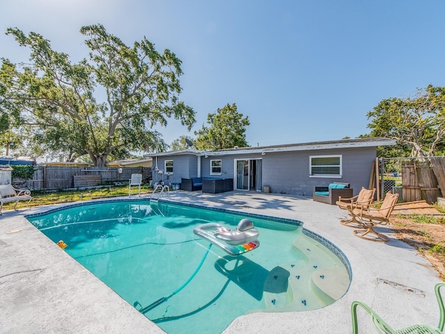 11397 122nd Ave, Largo, FL 33778 - view of pool with a patio area, an outdoor living space, and a fenced backyard