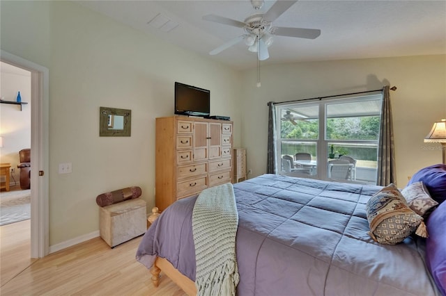 bedroom with baseboards, light wood finished floors, and ceiling fan