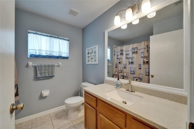 full bathroom featuring tile patterned flooring, vanity, toilet, a shower with curtain, and visible vents