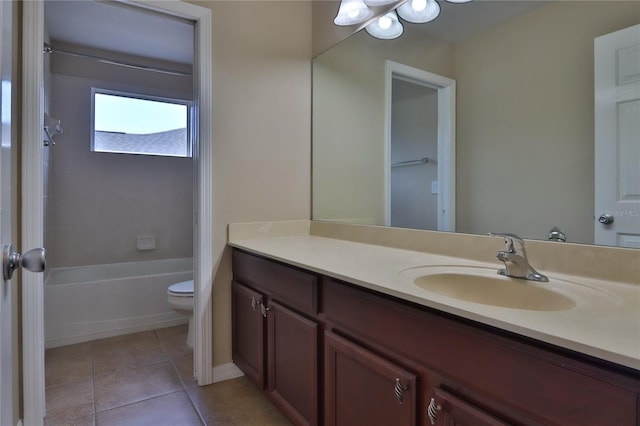 full bathroom featuring tile patterned flooring, shower / bathing tub combination, toilet, and vanity