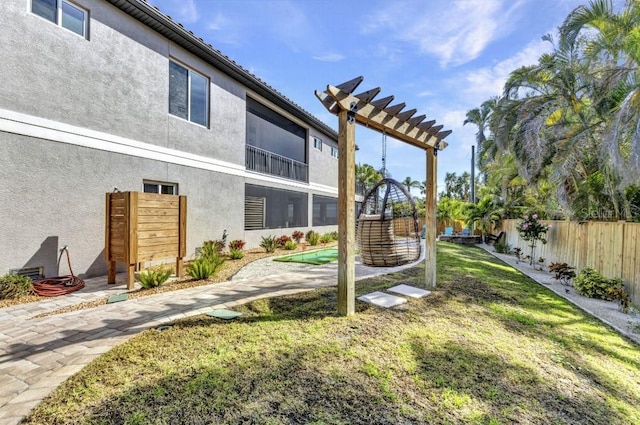 107 Sunset Dr, Nokomis, FL 34275 - view of yard featuring a pergola and fence