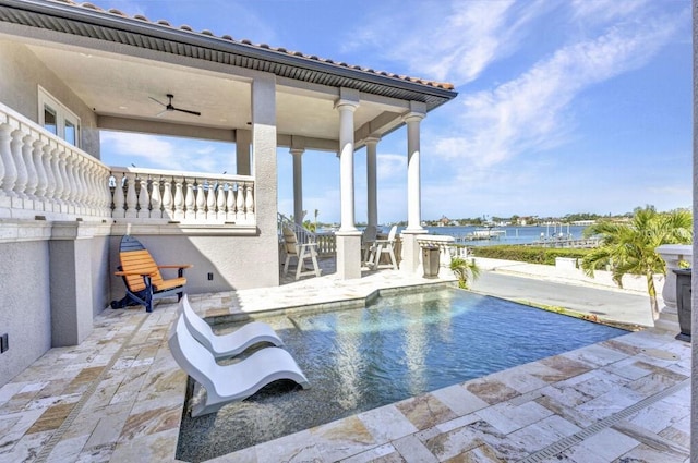 107 Sunset Dr, Nokomis, FL 34275 - outdoor pool featuring ceiling fan, a patio, and a water view