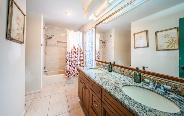 full bathroom featuring tile patterned flooring, a sink, shower / bathtub combination with curtain, and double vanity