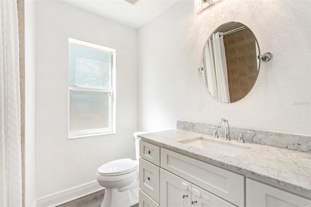 full bathroom with toilet, a shower with shower curtain, vanity, and wood finished floors