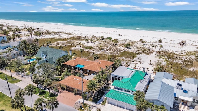 aerial view with a beach view and a water view