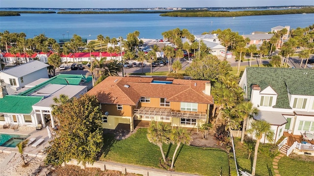bird's eye view with a residential view and a water view