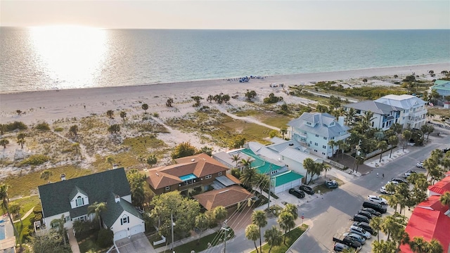 aerial view featuring a view of the beach and a water view