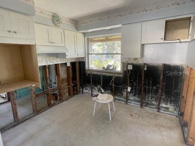 kitchen featuring white cabinetry