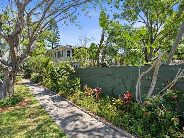 view of property's community with fence