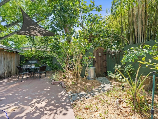view of patio / terrace featuring outdoor dining space and a fenced backyard
