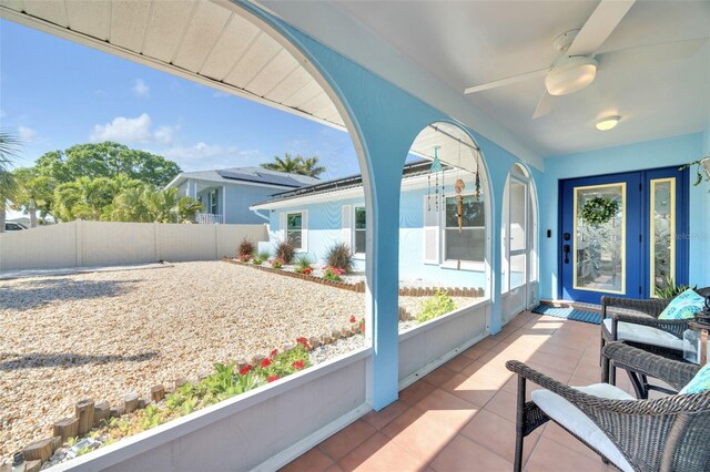1015 Spindle Palm Way, Apollo Beach, FL 33572 - sunroom / solarium featuring ceiling fan