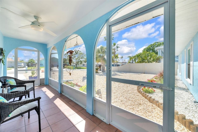 1015 Spindle Palm Way, Apollo Beach, FL 33572 - sunroom / solarium featuring a ceiling fan and a wealth of natural light