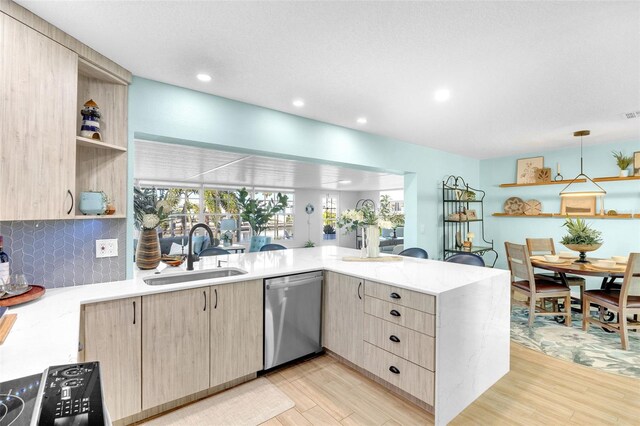 1015 Spindle Palm Way, Apollo Beach, FL 33572 - kitchen with a sink, light brown cabinets, open shelves, and dishwasher