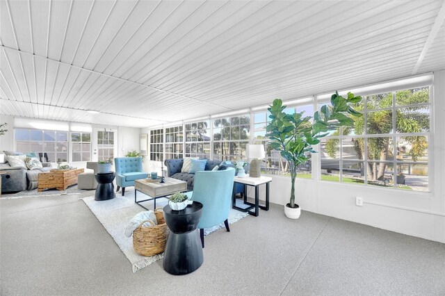 1015 Spindle Palm Way, Apollo Beach, FL 33572 - sunroom / solarium with wood ceiling, an outdoor living space, and speckled floor
