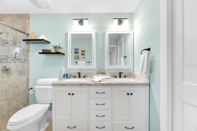 1015 Spindle Palm Way, Apollo Beach, FL 33572 - bathroom with a sink, toilet, and tiled shower
