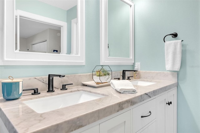 1015 Spindle Palm Way, Apollo Beach, FL 33572 - full bathroom with double vanity and a sink