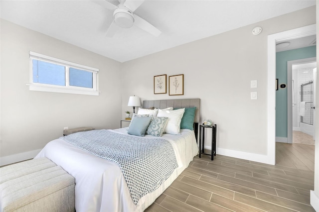 1015 Spindle Palm Way, Apollo Beach, FL 33572 - bedroom with baseboards, a ceiling fan, and wood finished floors