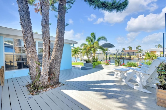 1015 Spindle Palm Way, Apollo Beach, FL 33572 - wooden deck featuring a water view